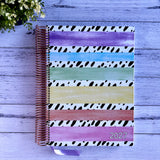 2027 Miss Amanda Kate Weekly Teacher Planner with Rainbow Stripes cover and rose gold coil binding