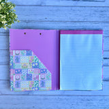 Patchwork Teacher Clipboard Folder open to show the 40-sheet lined notepad and internal document pocket